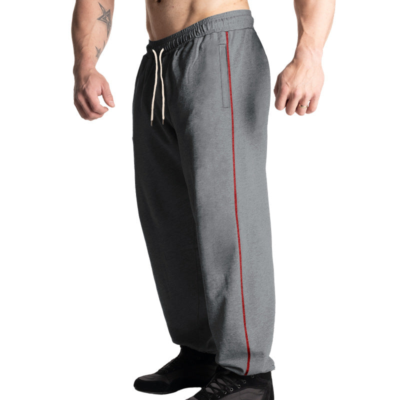 Herren nan weite Freizeit-Jogginghose mit elastischem Tunnelzugbund, dezentem Seitenstreifen und tiefen Eingrifftaschen EB
