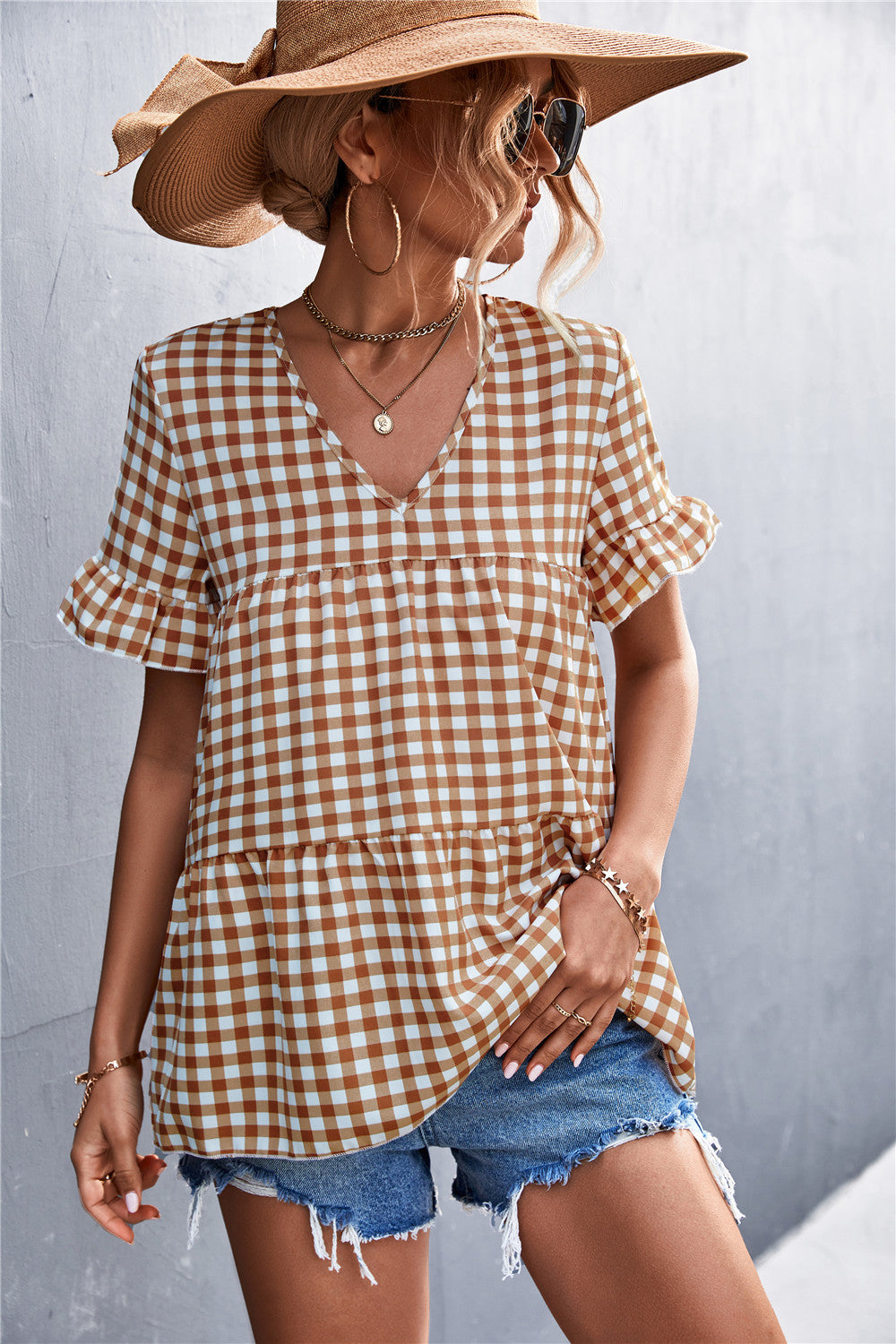 Damen Blusenshirt mit rüschenförmigem Saum und Karomuster EB