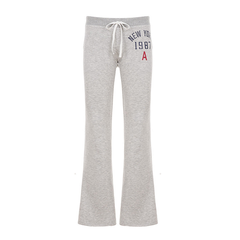 Damen nan weiche Flared-Jogginghose mit Kordelzug, Eingrifftaschen und auffälligem Love-Print EB