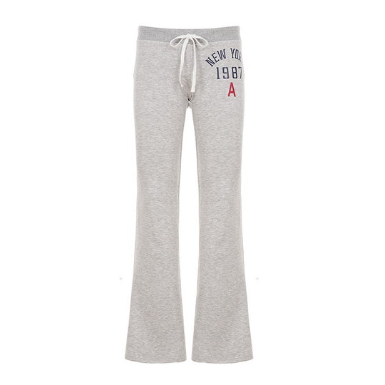 Damen nan weiche Flared-Jogginghose mit Kordelzug, Eingrifftaschen und auffälligem Love-Print EB