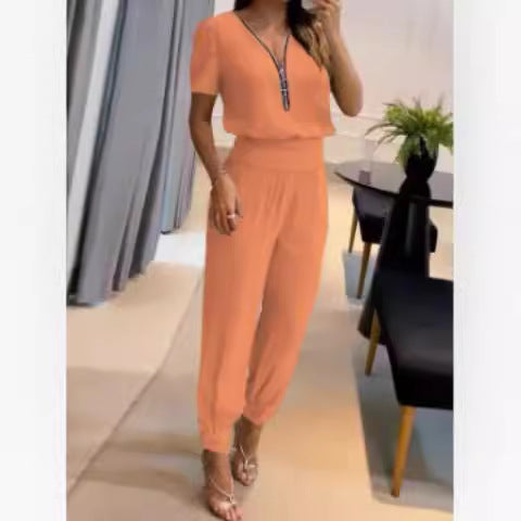 Damen Jumpsuit mit hochgeschlossenem Kragen und seitlichem Reißverschluss EB