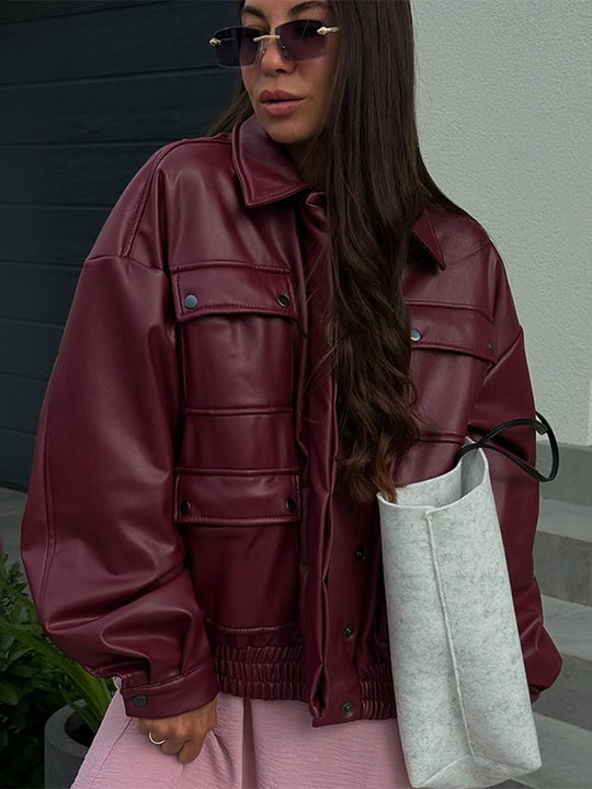 Damen oversized Kunstlederjacke mit funktionalen Taschen und elastischem Bund EB