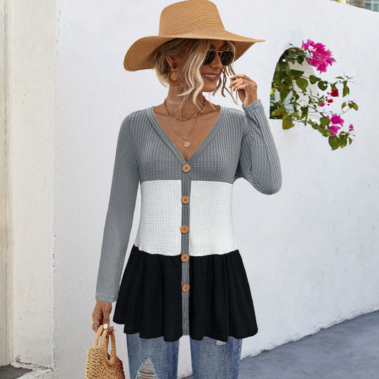 Damen modische Strickjacke mit knöpfigem Design und voluminösem Saum EB