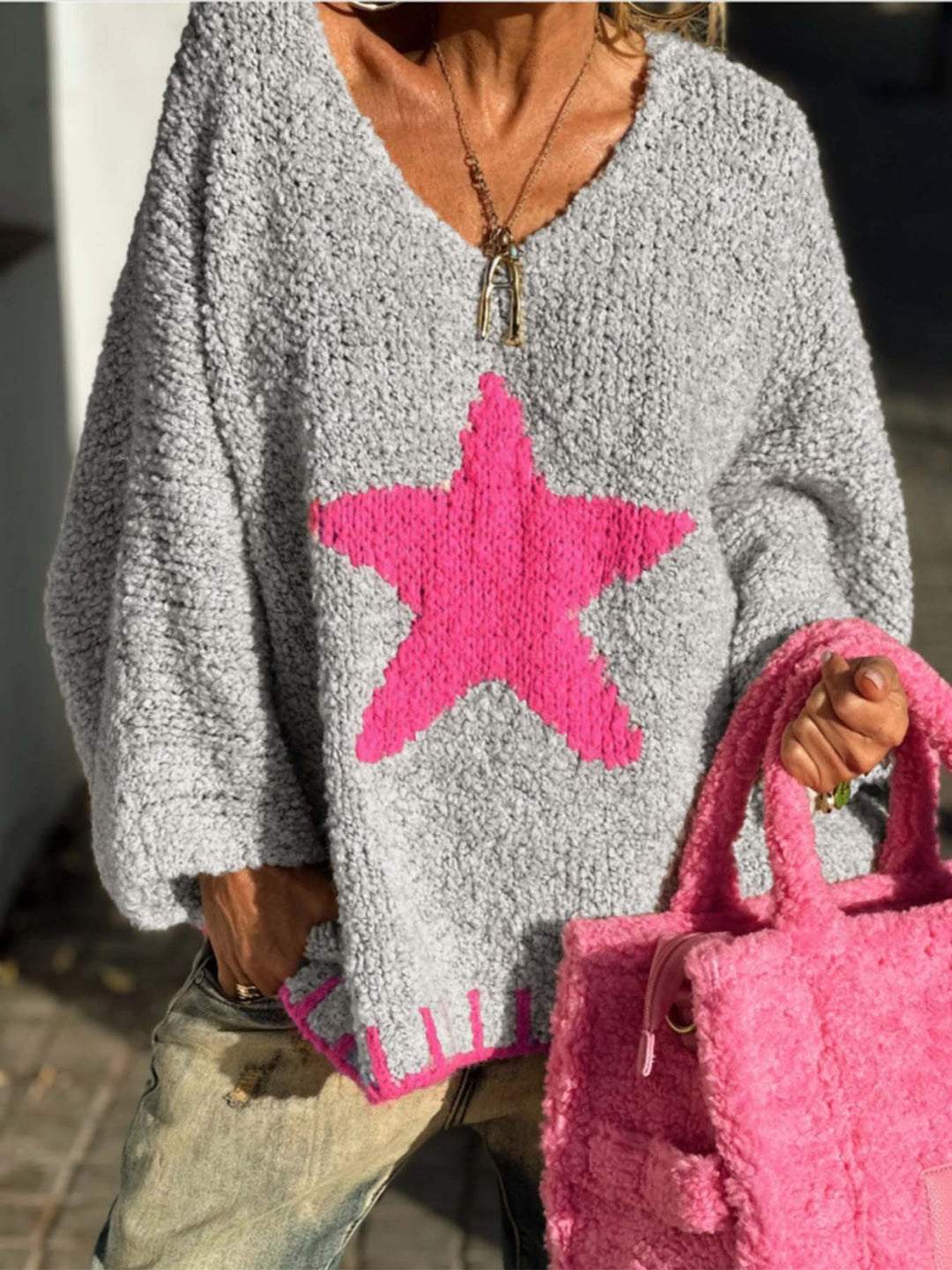 Damen Strickpullover mit V-Ausschnitt und auffälligem Sternenmuster EB