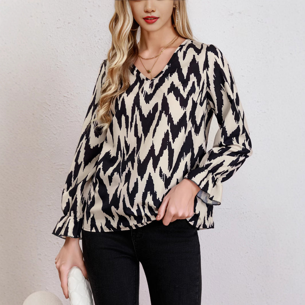 Damen Bluse mit modernem Zickzackmuster und eleganten Ballonärmeln EB
