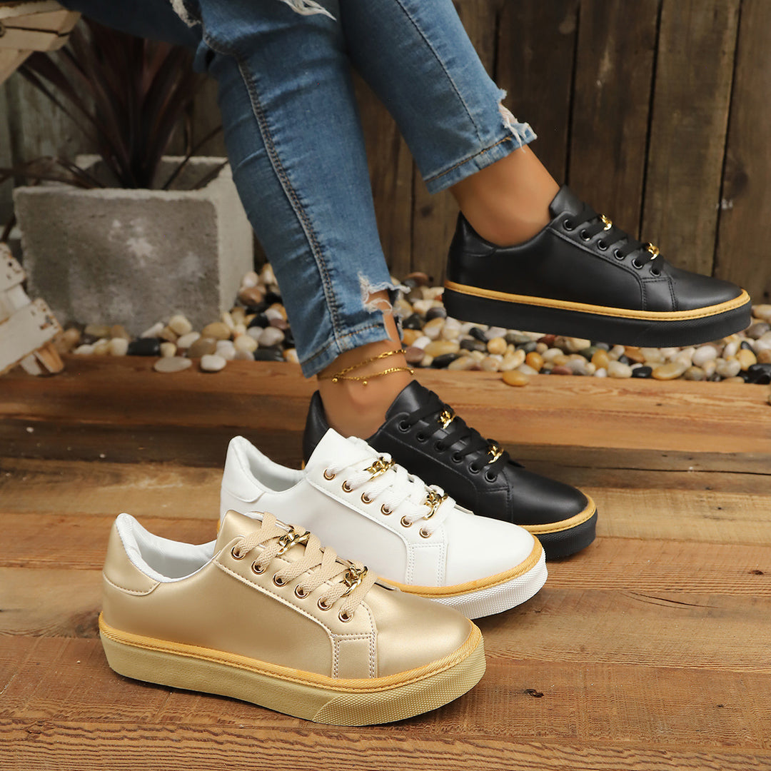 Damen Komfortable Sneaker mit hohem Sohlenrand und goldenen Akzenten EB