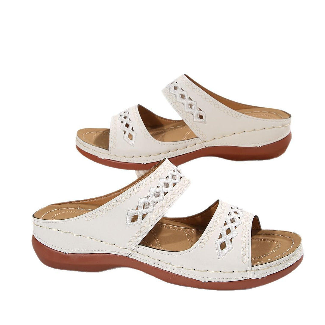 Damen Komfortable und luftige Pantolette mit Blumenmuster EB
