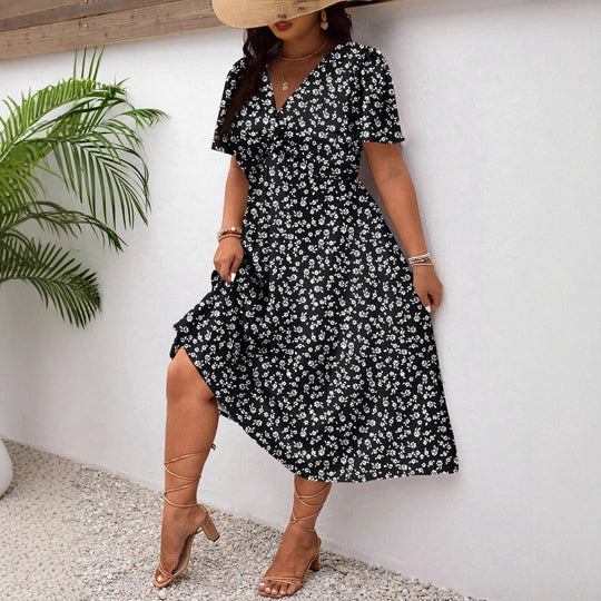 Damen Midi-Kleid mit Blumenmuster und vorteilhaftem Schlitz EB