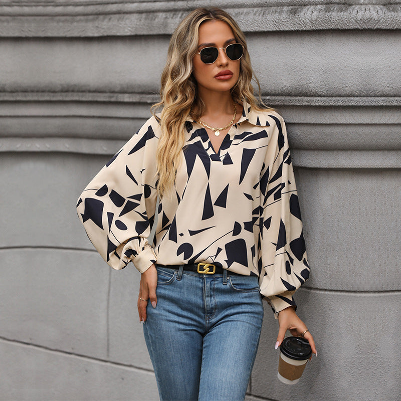 Damen Bluse mit elegantem geometrischen Design und Puffärmeln EB