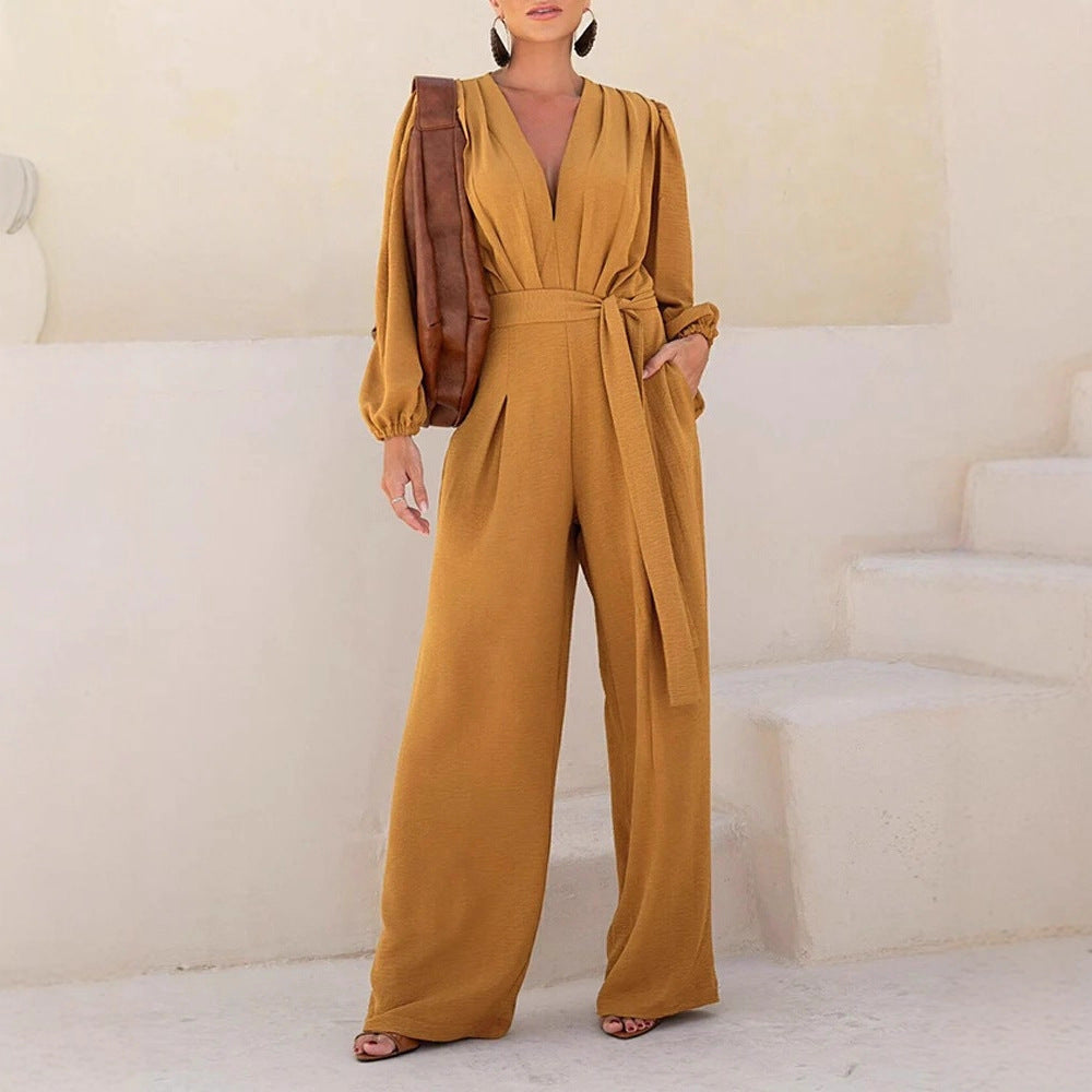 Damen Eleganter Palazzo-Jumpsuit mit tiefem V‑Ausschnitt, Bindegürtel und Ballonärmeln EB