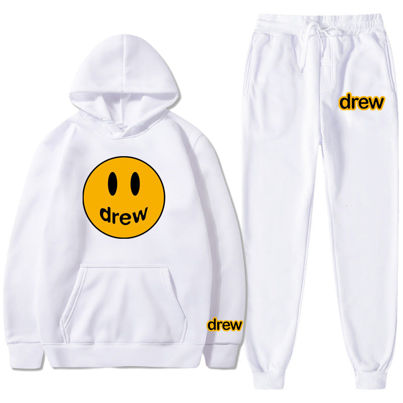 Unisex nan zweiteiliges Lounge-Set aus French-Terry mit Smiley-Print Kapuzenpullover und tapered Jogginghose EB