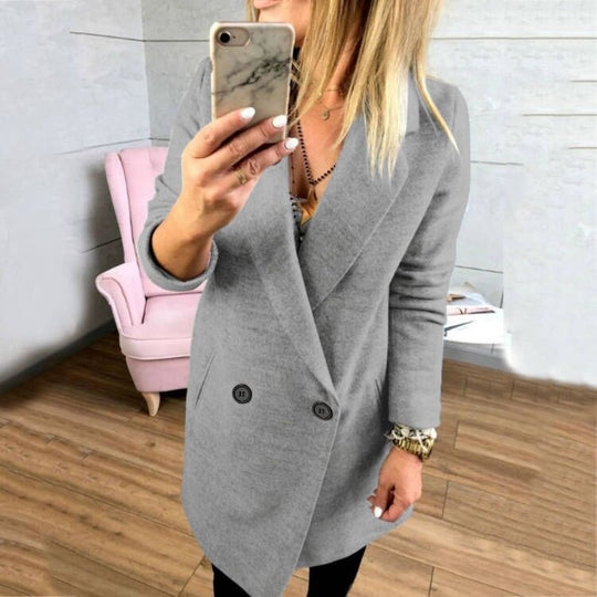 Damen Überlanger, taillierter Mantel mit elegantem Revers und praktischen Taschen EB