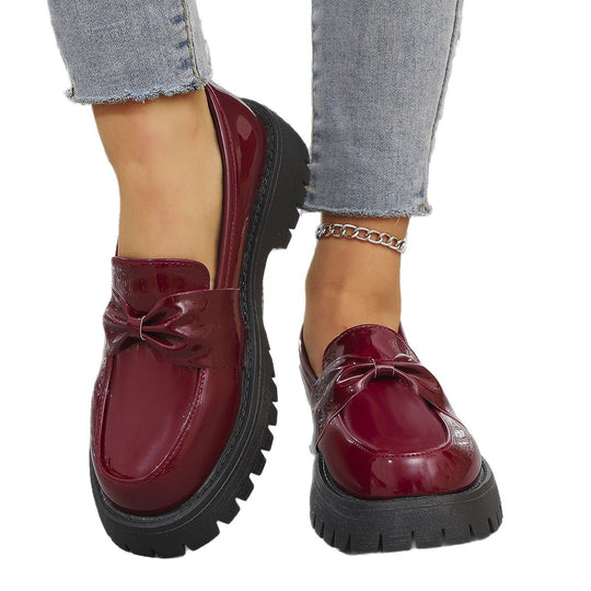 Damen  glänzende Plateau-Loafer mit übergroßer Schleifenapplikation und profilierter Gummisohle EB