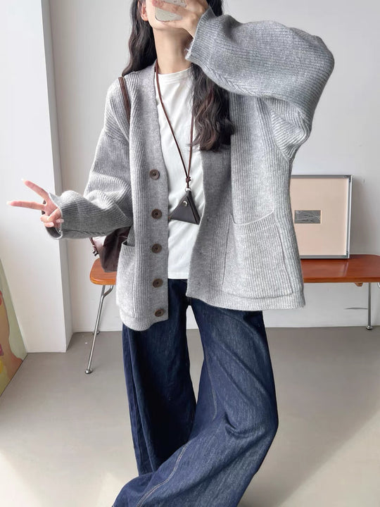 Damen Gemütliche Strickjacke mit großen Taschen und Knopfdetail EB