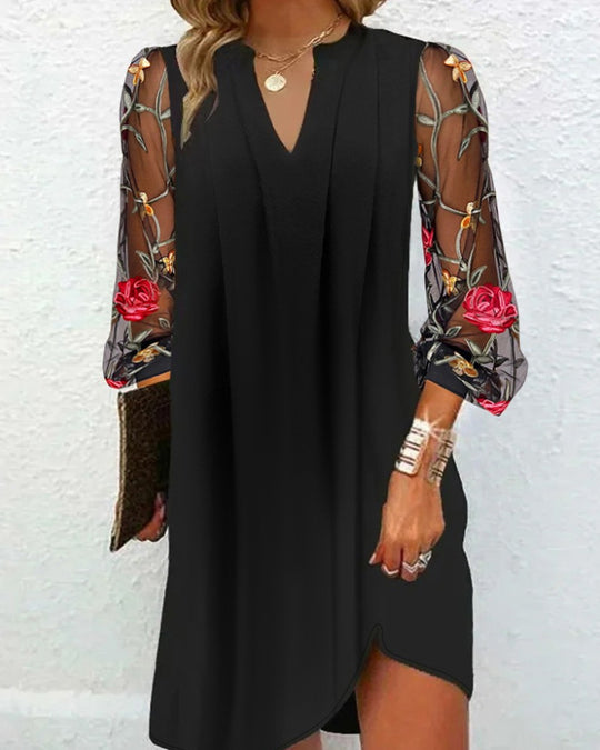 Damen Kleid mit transparenten Spitzenärmeln und floralem Design Heidi-Mode