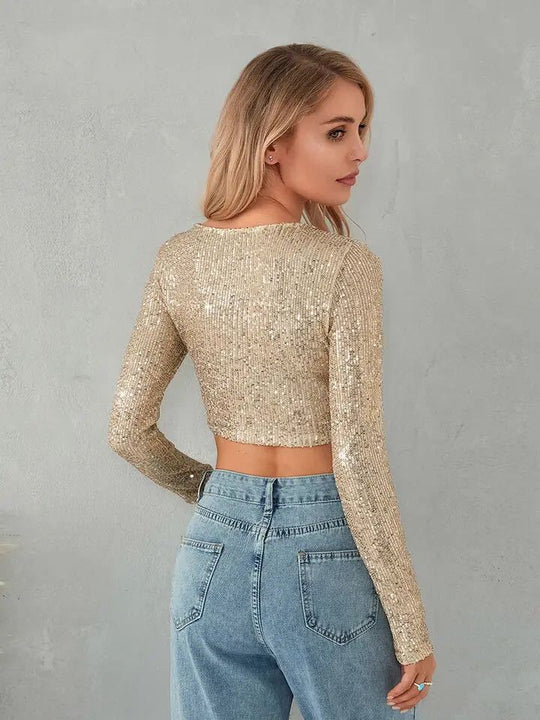Damen Glitzerndes Crop-Top mit langen Ärmeln und figurbetontem Schnitt EB
