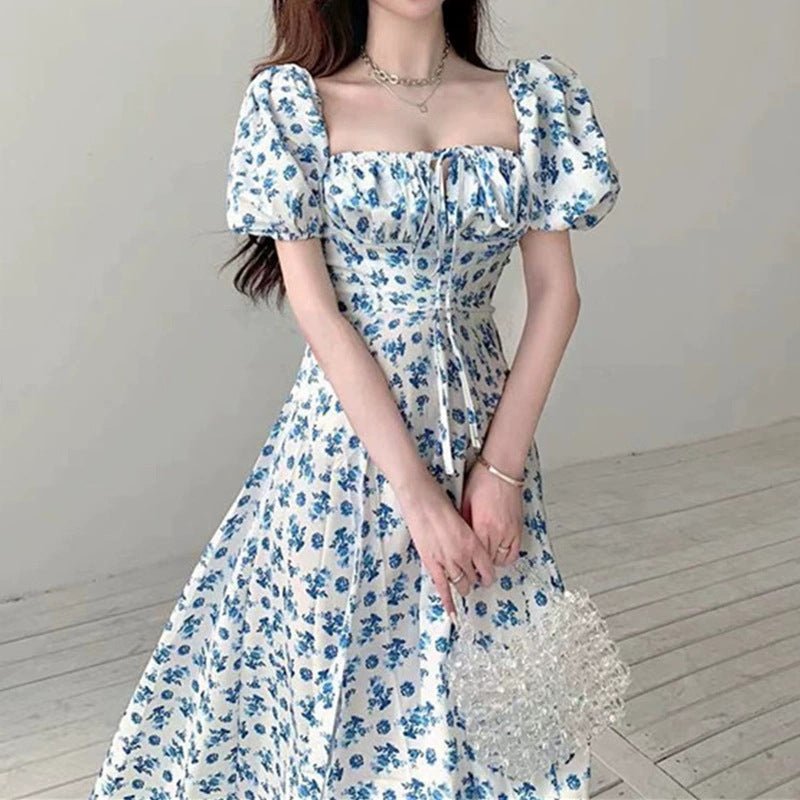 Damen Maxikleid mit eleganten Puffärmeln und floralem Design EB