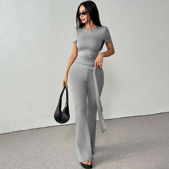 Damen elegantes Set aus figurbetontem Oberteil und ausgestellten Hosen EB