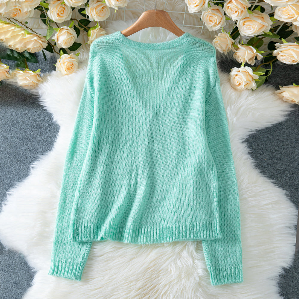 Damen gemütliche Strickjacke mit V-Ausschnitt und lässigen Puffärmeln EB
