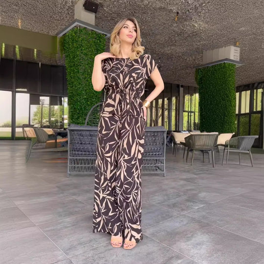 Damen Flowing Jumpsuit mit floralem Design und elastischer Taillierung EB