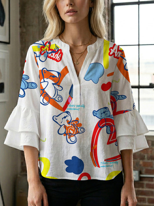 Damen Bluse mit voluminösen Rüschenärmeln und modernem Motiv EB