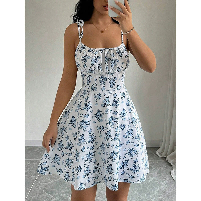 Damen Blumenkleid mit verstellbaren Spaghetti-Trägern und femininem Schnitt EB