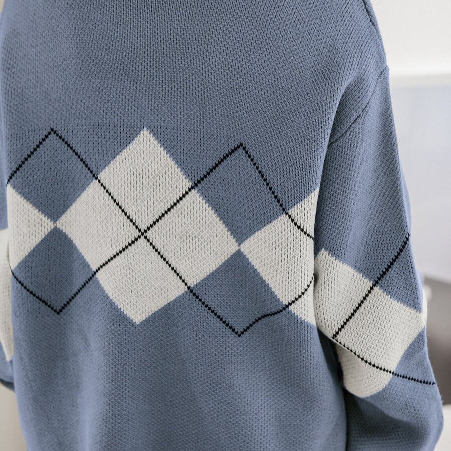 Damen stilvoller Pullover mit modernem Rautenmuster und verspielten Rüschendetails EB