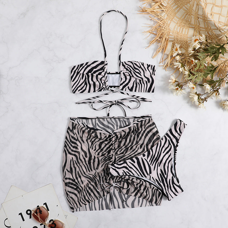 Damen Triangel-Bikini-Set mit transparentem Wickelrock und animalischem Muster EB