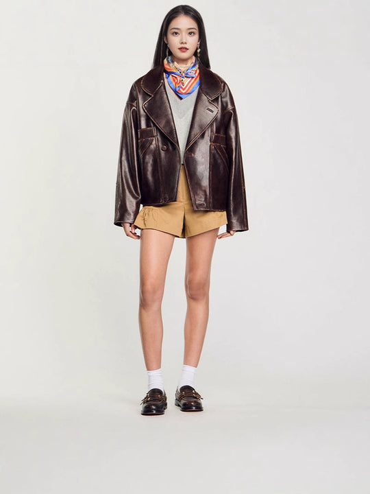 Damen Kunstlederjacke im lässigen Schnitt mit praktischen Taschen und stilvollem Revers EB