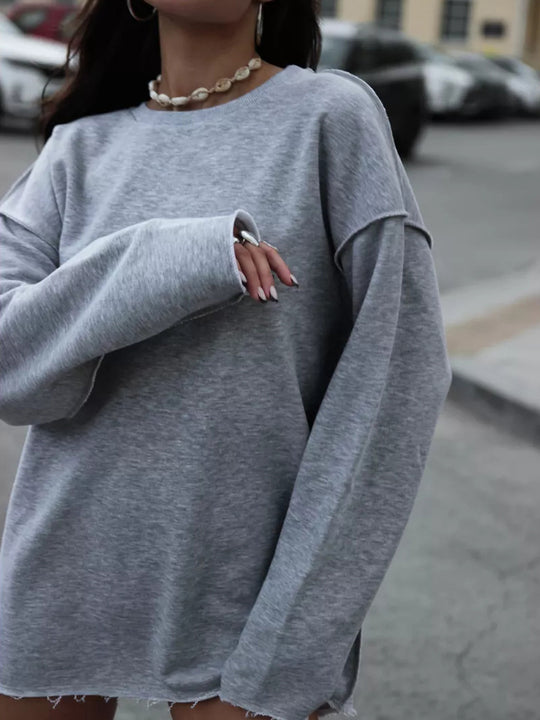 Damen oversized Sweatshirt mit ausgefranstem Saum und verlängerten Ärmeln EB