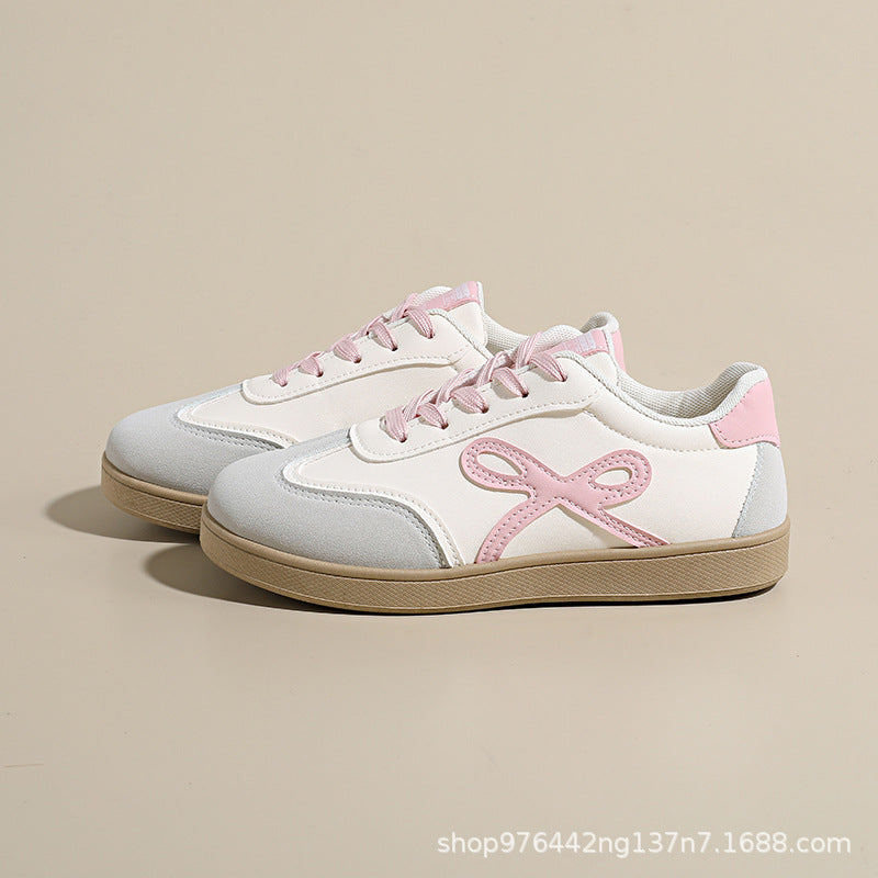 Damen Sneakers im sportlichen und eleganten Design mit rosa Akzenten EB