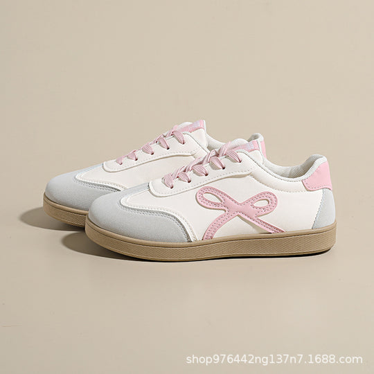 Damen Sneakers im sportlichen und eleganten Design mit rosa Akzenten EB