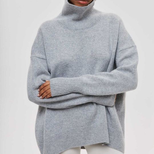 Damen Kuscheliger Oversize Rollkragenpullover mit verdeckten Seitenschlitzen und extra langem Rippbund EB
