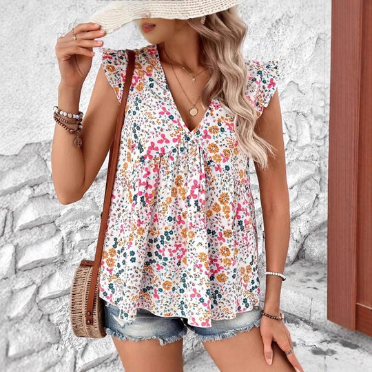 Damen Bluse mit floralem Design und voluminösen Ärmeln EB