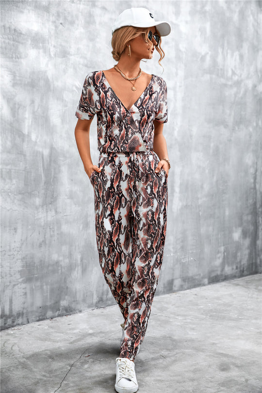 Damen elegante Jumpsuit im Snake-Print-Stil mit Taillengürtel und V-Ausschnitt EB