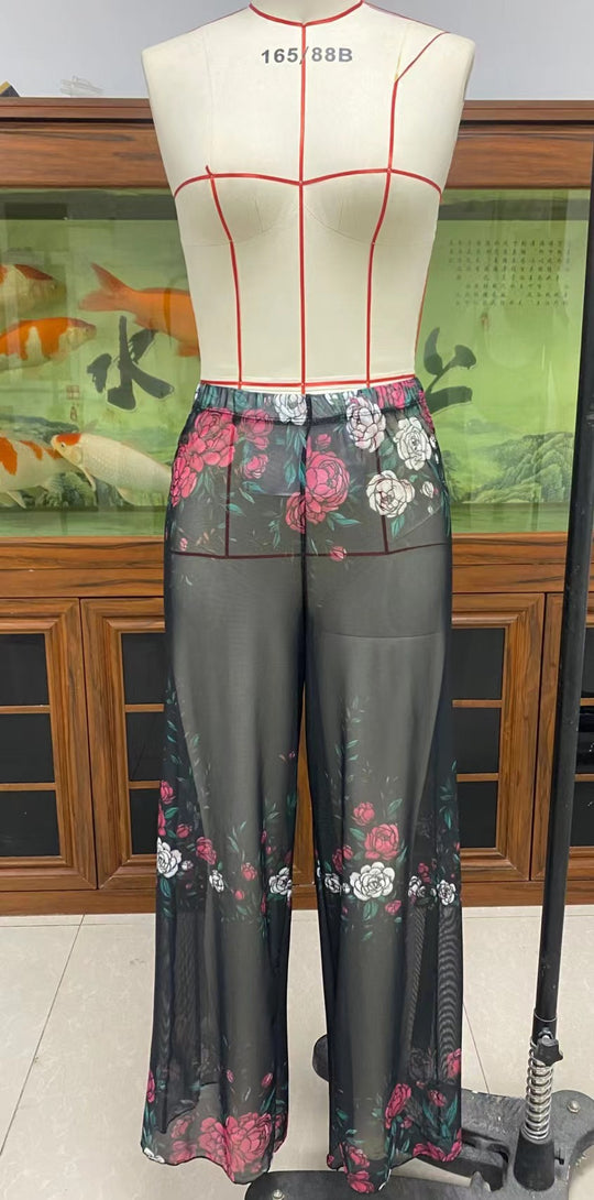 Damen Elegante Strandhose mit floralem Muster EB