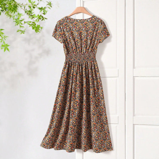 Damen Sommerliches Midikleid mit elastischem Bund und floralen Mustern EB