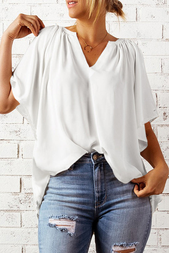 Damen Fließendes Blusenshirt mit ballonförmigen Ärmeln und elastischem Saum EB