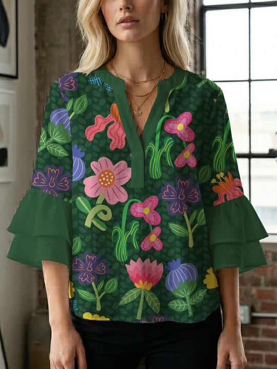 Damen Bluse mit voluminösen Ärmeln und floralem Design EB