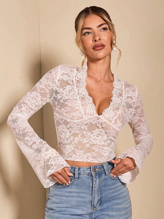 Damen Spitzenbluse mit romantischen Details EB