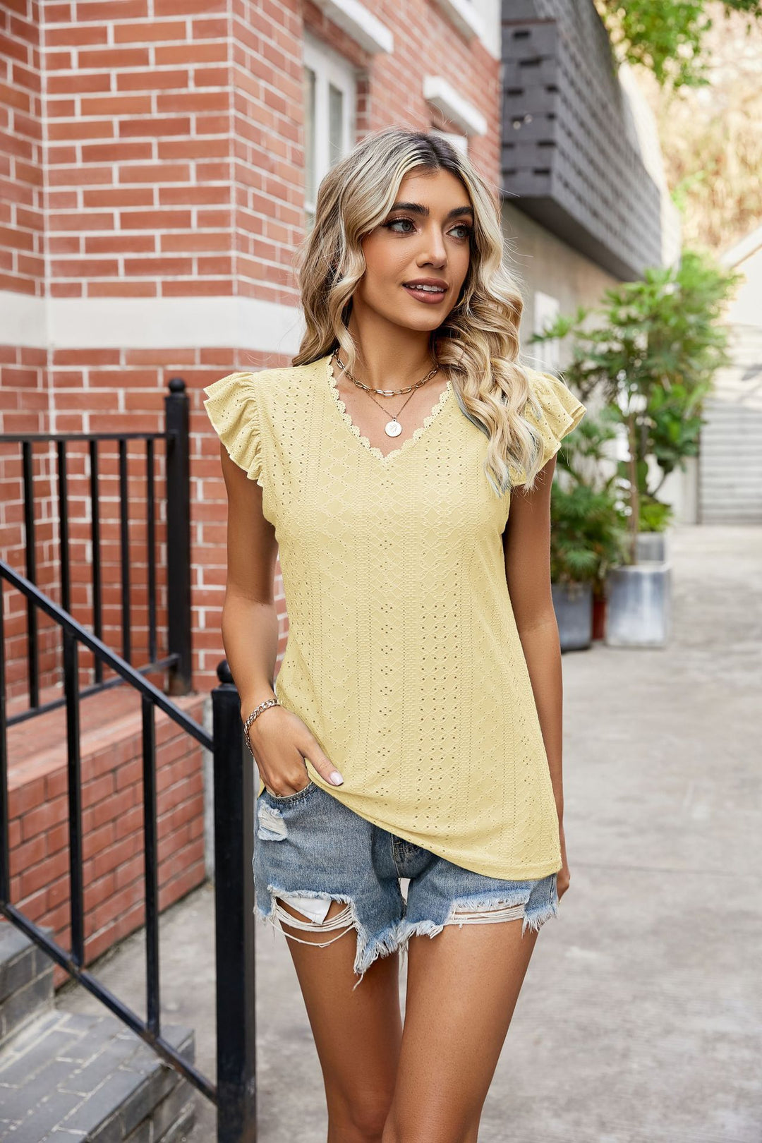 Damen Elegantes Freizeitoberteil mit verspielten Rüschendetails EB