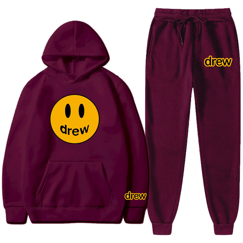 Unisex nan zweiteiliges Lounge-Set aus French-Terry mit Smiley-Print Kapuzenpullover und tapered Jogginghose EB