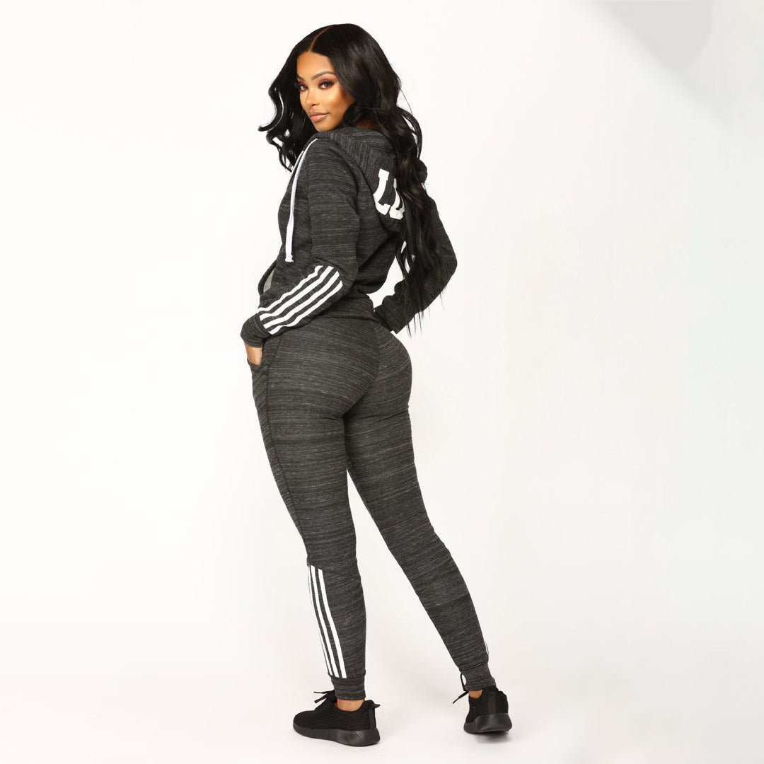 Damen sportliches Zip-Hoodie und Slim-Jogger-Set aus French-Terry mit kontrastierenden Streifen Eichborn Berlin
