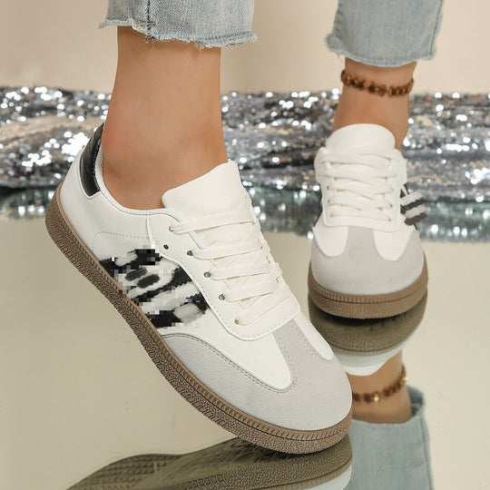Damen Sportliche Sneakers mit trendigem Animal-Design EB
