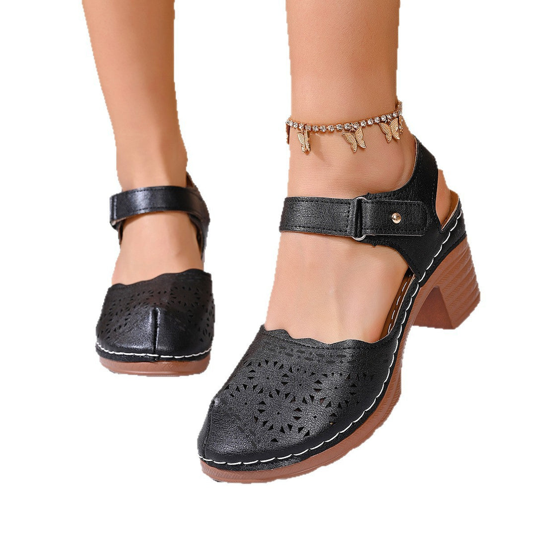 Damen Clogs mit floralen Perforationen und Komfort-Fersenriemen EB
