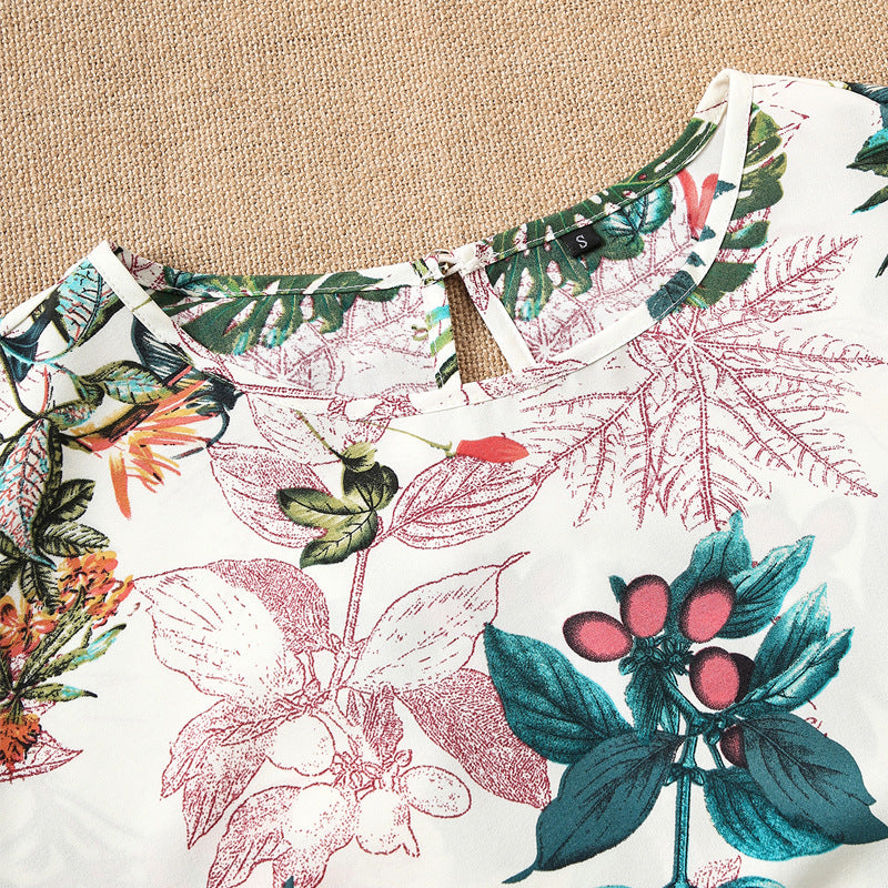 Damen Kurzarmbluse mit floralem Design und knotbarem Saum EB