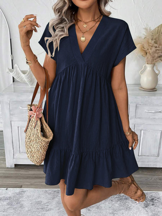 Damen kurzes Sommerkleid mit tiefem V-Ausschnitt und Rüschensaum EB