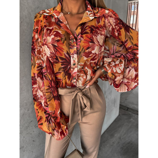 Damen Bluse mit floralem Druck und Glockenärmeln EB