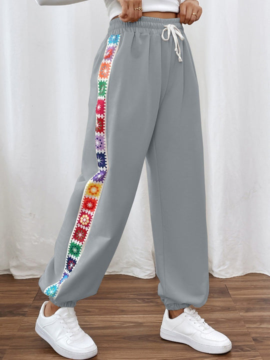 Damen Freizeit-Hose mit buntem Blumenmuster und elastischem Bund EB