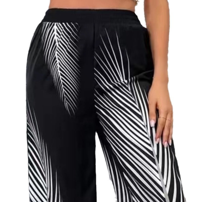 Damen Elegante und luftige Palazzohose mit Palmenmuster EB